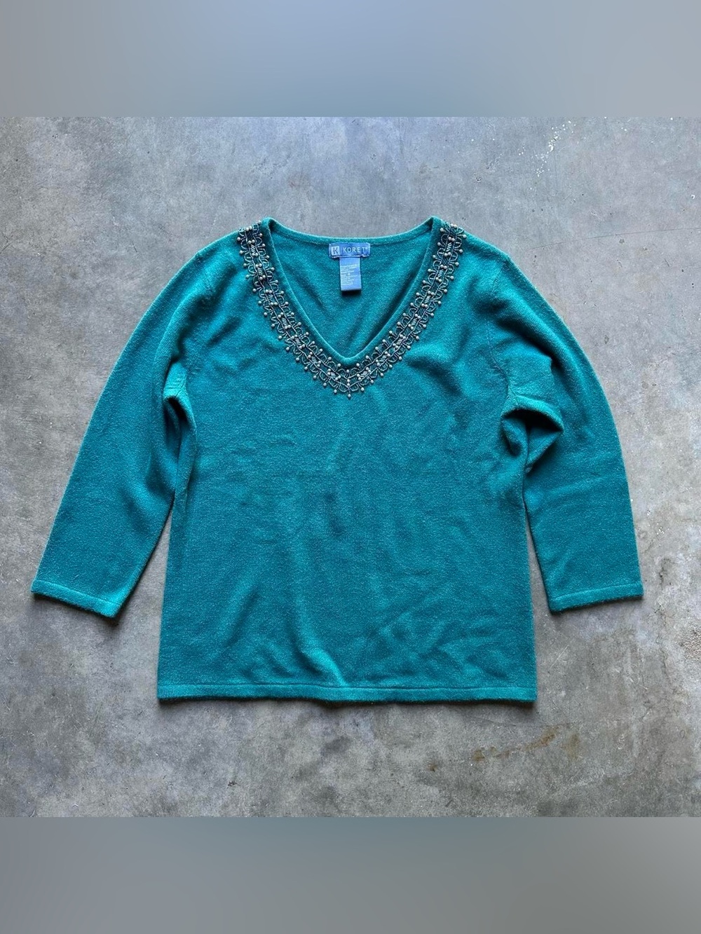 Teal beaded v-neck sweater
